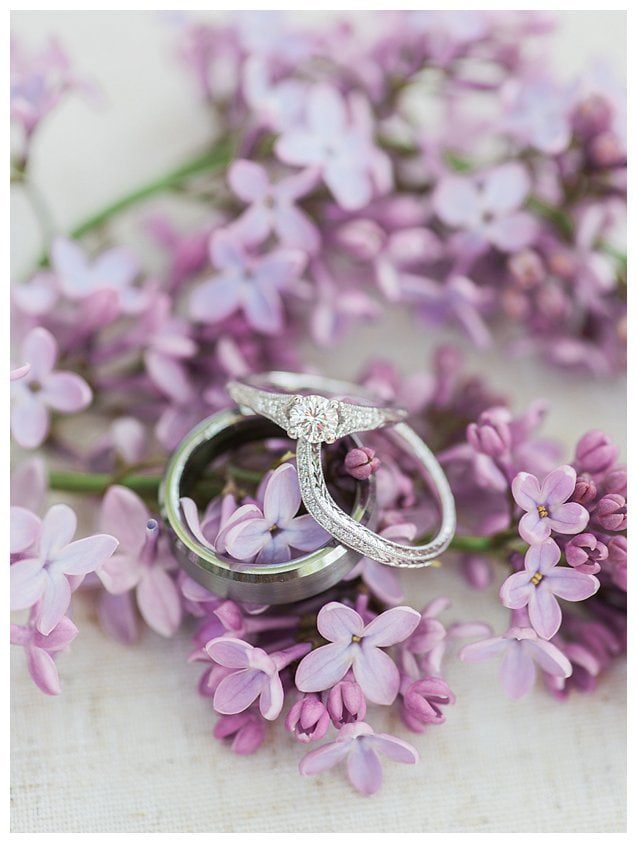 wedding rings on lilacs